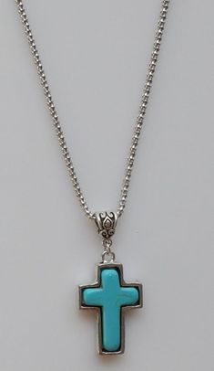 "CROSS: Zinc alloy / turquoise blue stone 1-1/4\" x 7/8\" CHAIN: Zinc alloy 18\" with lobster clasp. Come Visit Us at Our New Store! Please feel free to email me with questions about this item. Also please check my other listings. I am always available to answer your questions promptly. Buy from us with confidence." Silver Cross Jewelry, Pendant With Stone, Stone Cross, Handmade Angels, Wedding Accessories Jewelry, Cross Jewelry, Chain Pendant, Silver Cross, Pretty Jewellery