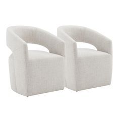 two white chairs sitting next to each other