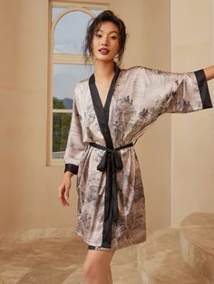 Crafted with meticulous attention to detail, our kimono robe embodies the essence of Eastern luxury, offering you a truly indulgent experience every time you slip it on. Its versatile design effortlessly transitions from leisurely mornings to elegant evenings, ensuring you stay elegant and refined throughout the day. • Silky Comfort: Made of high-quality polyester charmeuse, our short robes are soft, lightweight and cooling for summer. They have a smooth and breathable texture that feels just li Elegant Wrap Robe For Relaxation, Elegant Kimono With Kimono Sleeves For Home, Elegant Wrap Kimono For Home, Short Kimono Robe, Satin Kimono, Short Kimono, Womens Kimono, Silk Shorts, Bridal Robes