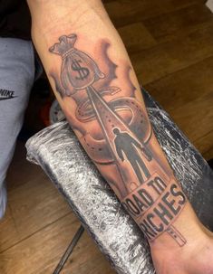 Road To Riches Money Tattoo Roads To Riches Tattoo, Road To Success Tattoo, Tattoo Ideas For Men Money, Road To Riches Tattoo Design, Road To Riches Tattoo Stencil, Tattoo Money Dollar, Money Is The Root Of All Evil Tattoo, Rags To Riches Tattoo, Money Tatoos Ideas