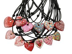 "Handpainded ceramic heart shaped charm, available in two sizes: - Small 0,91\" (2,3cm), options 1 to 5 and 12 and 13 - Big 1.11\" (2,8cm), options 6 to 11 with which we make a necklace suitable for our beloved women and girls. There are five different ways to wear these beautifull hearts: - Three colours of cord, easy to wear, thanks to the fluctuating knots that shape its size: Black, red, fuchsia, both in women's or girl's size - Stainless steel chain, both in women's or girl's size. - Earrin Valentine's Day Heart Pendant Necklace With Adjustable Cord, Valentine's Day Jewelry With Adjustable Cord As Gift, Valentine's Day Adjustable Cord Jewelry Gift, Heart Shaped Necklace With Adjustable Cord As Gift, Make A Necklace, Ceramic Heart, Necklace Love, Gifted Kids, Gift Handmade