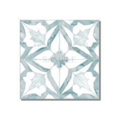 a white and blue tile design with leaves on it's sides, in the middle of