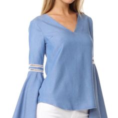 V Neck, Bell Sleeve. Super Soft Chambray. 100% Tencel. Crochet Arm Details. Size: Xs Pit To Pit: 16.5” Length: 26.5” Condition: New With Tags Offers And Bundles Welcome *Measurements Are Approximate 243 Chambray Top, Lovers And Friends, Bell Sleeve, Chambray, Bell Sleeves, Blue White, Top Blouse, Bundles, Blue And White