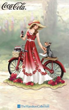 a woman in a red and white dress on a bicycle with a cat sitting on the back