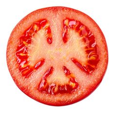 a tomato cut in half on a white background