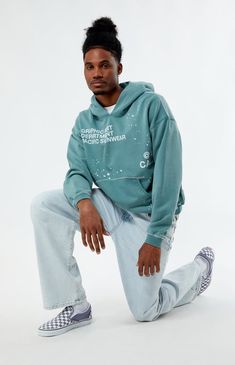 The PacSun Terrain Hoodie combines style and comfort seamlessly. Featuring a hooded neckline, long sleeves, and a regular fit, it's perfect for everyday wear. With a kangaroo pocket for added convenience and fleece fabrication for warmth, it's both practical and cozy. Plus, custom graphics printed on the front and back add a unique touch to your look, making it a standout piece in your wardrobe.


	Hooded neckline
	Long sleeves
	Standard fit
	Kangaroo pocket
	Fleece fabrication
	Machin Pacific Sunwear, Pacsun Mens, Hoodies And Sweatshirts, Mens Hoodie, Hoodie Green, Custom Graphics, Mens Sweatshirts Hoodie, Tee Shop, Exclusive Collection