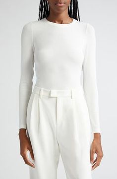 Minuscule ribs make this supersoft and stretchy modal top an instant favorite whether layered or worn alone. 21" length (size medium) Crewneck Long sleeves 97% modal, 3% elastane Hand wash, dry flat Imported Favorite Daughter, Top Brands, Long Sleeve Tops, Tee Shirts, Nordstrom, Womens Tops, Long Sleeve, Luxury Fashion