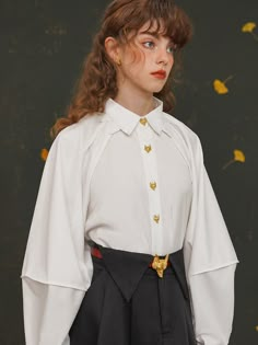 A long shirt with a beautiful golden fox clasp.
 The design of the loose sleeves and the long length will give you a stylish look. 
The sharp eyes of a golden fox shining in the middle of a simple shirt make this an impressive item that will catch the eye of anyone who sees it.



 You can purchase the belt here .



 <color>



 olive green

 off white






 <Size>





 small size






 Length: 73.5cm

 Bust: 102cm

 Sleeve length: 74.5cm




 medium size



 Length: 75cm

 Bust: 106cm Nordic Fairy, Sharp Eyes, Fantastic World, Gold Fox, Charming Eyes, Fox Shirt, White Shirt Blouse, Gold Outfit, Loose Sleeves