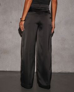 Sheen, smooth satin for date night? Yes please! It's our favorite way to enter the evening, in our Shannell Satin Trouser Pants. These pants fit to flatter with a wide leg, high structured waistband and sleek, slip pockets. Fits true to size High rise structured waistband with belt loops Wide leg fit Front slip pockets & back faux pockets Smooth, shiny satin fabric Front zip fly & button closure Black Satin Pants Outfit, Satin Pants Outfit, Western Office, Vici Collection, Satin Trousers, Select Shop, Satin Pants, Pants Fit, Swimwear Bottoms