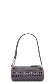 Find ALAÏA Mini Tube Bag In Grey on Editorialist. ALAÏA Mini Tube Bag in Grey Calfskin leather exterior with lambskin lining. Made in Italy. Top zipper closure. One main compartment. Vienne pattern inspired by precious lace and moucharabieh architectural openwork. Leather shoulder strap. Measures approx 6 W x 2.5 H x 2.5 D Shoulder strap with a 6.5 drop. ALIA-WY114. AA1P042CA262. About the designer: The late Azzedine Alaïa had a comprehensive understanding of the female form, thanks to an education in sculpture from École des Beaux-Arts. Revered for his bodycon silhouettes that defined the aesthetic of Paris in the ‘80s, the Tunisian designer was also known for his intricate footwear, statement bags and laser-cut accessories. Designer Pouch With Detachable Handle For Everyday, Designer Evening Bag With Removable Pouch For Everyday, Top Handle Evening Bag With Silver-tone Hardware, Designer Everyday Pouch With Detachable Strap, Everyday Use Clutch Shoulder Bag With Silver-tone Hardware, Everyday Clutch Shoulder Bag With Palladium Hardware, Luxury Clutch Shoulder Bag With Gunmetal Hardware, Luxury Pouch Shoulder Bag With Gunmetal Hardware, Luxury Shoulder Clutch Bag With Gunmetal Hardware