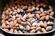 some almonds are cooking in a pot on the stove