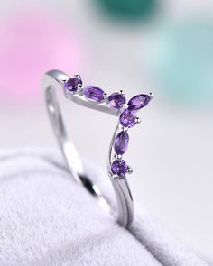 Amethyst Marquise Cut Wedding Rings, Purple Marquise Cut Promise Ring, Purple Birthstone Stackable Rings For Wedding, Purple Amethyst Stackable Wedding Rings, Purple Gemstone Stackable Rings For Wedding, Purple Marquise Cut Ring For Wedding, Silver Open Amethyst Ring For Wedding, Purple Half Eternity Ring For Anniversary, Purple Round Band Wedding Ring