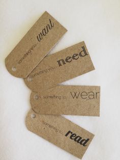 four tags with words on them that say i need to wear, and some are not