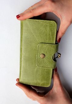 Our Odilynch Large Evanna Clip frame clasp closure wallet has a middle clip purse, width is 9.5cms, height is 18cms, width fully open is 19.5, kiss clip frame measures 15.5cms. This leather wallet is a perfect accessory to fit your cards, notes, coins and other essentials.  Perfect for everyday or formal event clutch Classic Green Wallet For Daily Use, Handmade Green Wallets For Everyday, Green Rectangular Coin Purse For Everyday Use, Green Rectangular Wallets With Card Slots, Green Rectangular Wallet With Card Slots, Classic Green Rectangular Coin Purse, Vintage Green Wallets With Card Slots, Green Coin Purse With Card Slots For Daily Use, Green Rectangular Wallets For Daily Use