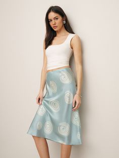 Silky silk. Shop the Ella Silk Skirt from Reformation, a midi length skirt with a mid rise. Midi Length Skirts, Silk Charmeuse, Silk Skirt, Midi Length, Fabric Care, Knit Top, Mid Rise, Spa, Silk