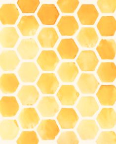 yellow honeycombs on white background with watercolor stains in the middle and bottom