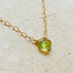 Essential Energy Gemstone Necklace: Peridot - Cleansing – E. Shaw Jewels Dainty Everyday Faceted Necklaces, Delicate May Birthstone Gemstone Necklace, Minimalist Gemstone Necklaces For May Birthstone, Fine Jewelry Peridot Necklace For May Birthstone, Fine Jewelry With Peridot Gemstone, May Birthstone Faceted Yellow Gold Jewelry, May Birthstone Yellow Gold Faceted Jewelry, 14k Gold Filled Necklace For May Birthstone, Delicate Stackable Necklaces As Gift