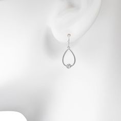 These gorgeous silver tone teardrop cubic zirconia nickel free drop earrings are the perfect way to finish any outfit. These gorgeous silver tone teardrop cubic zirconia nickel free drop earrings are the perfect way to finish any outfit. Length: 1.639 in. Backings: fishhook Metal: brass Plating: silver tone Finish: polished Stone: cubic zirconia Additional details: nickel free Not appropriate for children 14 years old and younger. Size: One Size. Gender: female. Age Group: adult.