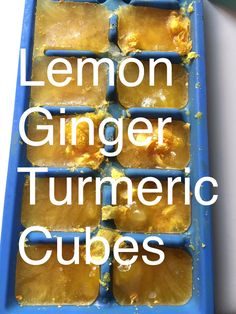 lemon ginger turmeric cubes in a blue tray with the words lemon ginger turmetic cubes