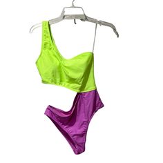 Cabana Del Sol Swimsuit One Piece One Shoulder Small Green Light Purple Bright Underarm To Underarm = 13” Length= 26” Get Ready To Flaunt Your Style In This Eye-Catching Cabana Del Sol One-Shoulder Swimsuit. With Its Vibrant Green And Light Purple Color Combination, This One Piece Is Perfect For Any Woman. Made For Those With A Size S, This Swimsuit Is A Must-Have For Any Wardrobe. The Swimsuit Boasts A Unique Design And Is Crafted From High-Quality Materials To Ensure Durability. Cabana Del Sol Amanita Nightshade, Purple Color Combinations, Upcycle Design, Purple Swimsuit, Light Purple Color, Shoe Making, Swimsuit One Piece, One Shoulder Swimsuit, Future Clothes