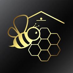 a honeycomb with a bee on it and the word honey written in gold foil