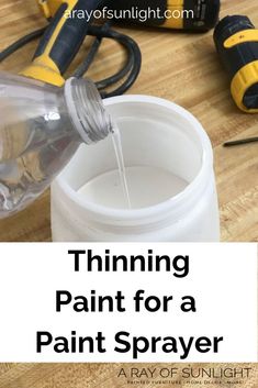 a spray bottle with paint on it and the words thinning paint for a paint sprayer