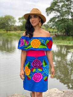 This Beautiful Off the Shoulder Mexican Dress is the perfect Party dress. It's comfortable with elastic around the shoulders and has a tie on the back of the dress for an adjustable fit. Machine Embroidered- hand manipulated. Embroidery will vary on each unique dress. Purchase the belt here: https://www.etsy.com/es/listing/690070823/fajo-artesanal-mexicano-accesorios-para?click_key=04d267b6eaaae94cd493334a5b4fb8a3298c036e%3A690070823&click_sum=7886377f&ref=shop_home_active_3&pro=1&frs=1&sts=1 Mo Fitted Dress For Fiesta Festival, Fitted Blue Fiesta Dresses, Fitted Blue Dress For Fiesta, Blue Fitted Dress For Fiesta, Fitted Multicolor Embroidered Maxi Dress For Summer, Fitted Multicolor Embroidery Maxi Dress For Summer, Traditional Blue Fiesta Dress, Fitted Multicolor Embroidered Dress For Festivals, Fitted Multicolor Embroidered Dress For The Beach