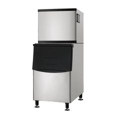 a silver refrigerator freezer sitting on top of a white counter next to a trash can