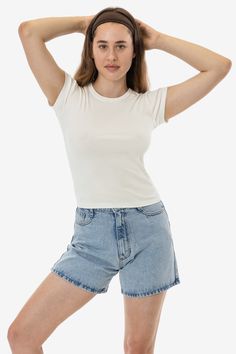 This versatile t-shirt is made of our 1x1 combed cotton baby rib and has been garment dyed to match our bestselling styles. This top has a feminine cut with cap sleeves and a crew neckline finished with tasteful binding. Semi-fitted with a flattering mid-length cut. This 100% cotton has been garment dyed and is shrink-free! Made in the USA with US-grown cotton by workers earning fair wages. This item is a garment dye product. Garment dye items can be distinguished by “GD” at the end of their sty Denim Short Jumpsuit, Denim Tote, Jumpsuit Jacket, T Shirt For Women, Crew Neck Shirt, Cotton Baby, Festival Wear, Cotton Style, Cap Sleeve