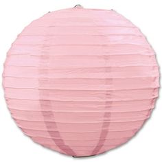 a round pink paper lantern on a white background