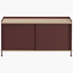 The Enfold Sideboard (2018) combines industrial materiality with residential references for a new perspective on modern storage. Made from lacquered steel that gently enfolds its solid wood top and bottom, it fuses cold and warm materials for a unique expression, paired with the vibrantly modern look of its ridged steel doors. Made in Sweden. | Enfold Sideboard, Low, Oak/Deep Red at Design Within Reach Steel Front Door, Steel Panels, Storage Credenza, Credenza Sideboard, Modern Storage, Grey Oak, Steel Doors, Design Within Reach, New Perspective