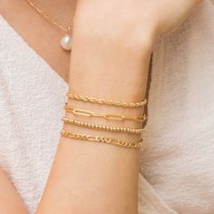 Our Chunky Paperclip Bracelet is the perfect everyday bracelet for those who want something bold, yet minimal. Pair it with our Coin Chain Bracelet and Pearl & Gold Bead Bracelet for the perfect stack. DETAILS Bracelet length: 6.5" with 1" extender 14k gold filled -or- sterling silver chain, lobster clasp, & findings Link size: 3.7mm x 13mm Safe for sensitive skin & shower safe Matching necklace: Chunky Paperclip Necklace Everyday Jewelry Gold, Paperclip Bracelet, Brazilian Gold, Minimal Bracelet, Stretchy Beaded Bracelet, Signature Bracelet, Figaro Chain Necklace, Everyday Bracelet, Gold Rope Chains