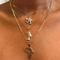 PRICES MAY VARY. African map necklaces is made of alloy,strong and durable, not easy to fade and break. It is small and lightweight but with good colour and shine Egyptian Queen jewelry necklaces are 3 layer,approx size is15.7in（40cm）+17.7in（45cm）+19.6in（50cm）+(2.3in"（6cm）+extender chain),weight 25.6g,There is no worry about the length cause its adjustable and flexible chain, which will adapt your neck Gold adjustable necklaces feature in elephant,Egyptian Queen and map.Special design adds atmos Africa Necklace, Elephant Pendant Necklace, Casual Necklaces, Animal Pendant, African Necklace, Map Necklace, Layered Necklace Set, Elephant Necklace, Multi Layer Necklace