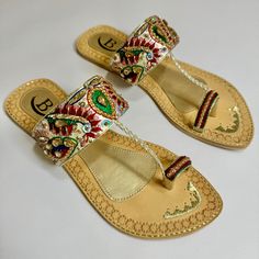 Introducing the Heera Mandi Collection, where tradition meets modern flair in a stunning fusion of Eastern and Western influences. Inspired by the vibrant colors of Lahore's rich culture, this collection brings a fresh vibe to classic design. Crafted on real leather soles, these Sandals showcase a captivating blend of dark green and deep maroon hues, brought to life with intricate embroidery and dazzling stonework. Each pair is a masterpiece, reflecting the soul of Lahore while embodying contemp Flat Wedding Shoes, Punjabi Jutti, Deep Maroon, Shoes Party, Wedding Shoes Flats, Intricate Embroidery, Party Shoes, Wedding Shoes, Women's Shoes Sandals