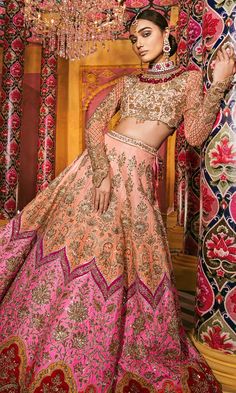 Pink and Peach Wedding Lehenga in Raw Silk with zardozi embroidery This lehenga set is in Raw Silk with zardozi embroidery on skirt and blouse. Dupatta edges are also embroidered in hand embroidery. You have the option to change the Color and blouse style according to your requirements. Please contact our Sales Team through WhatsApp +61470219564 to discuss your requirements. Brand: Panache Haute Couture Availability: Online and In-store Production Time & Delivery: 8-12 Weeks Fabric- Lehenga - Ra Peach Color Lehenga, Lehenga Combination, Pink And Peach Wedding, Indian Designer Lehenga, Mehndi Bridal, Peach Lehenga, Mehndi Bride, Pakistani Mehndi, Lehenga Bridal