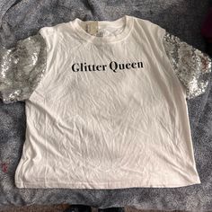 Nwt Glitter Queen Tee With Sequined Sleeves. Smoke Free Pet Free White Cotton Party T-shirt, Stretch T-shirt With Letter Print For Party, Short Sleeve Shimmer Tops For Summer, Trendy Shimmer Summer Tops, Trendy Shimmer Tops For Spring, Trendy Shimmer Tops For Summer, Spring Glitter Print Top For Night Out, Spring Glitter Print Tops For Night Out, Glitter Print Tops For Spring Night Out