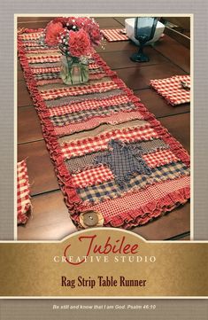 the table runner is made with red and black plaid fabric