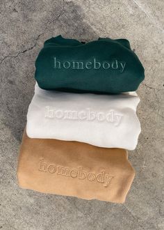 Homebody Crewneck | glee + co | responsibly made in LA Cozy Crewneck Outfit, Things To Embroider On Machine, Embroidered Crewneck Aesthetic, Sweatshirt Product Photography, Trending Crewneck, Embroidered Clothes Ideas, Inspirational Sweatshirts, Book Crewneck, Homebody Sweatshirt