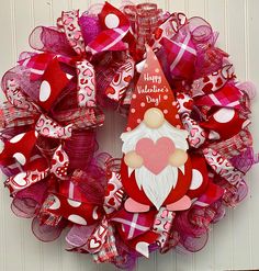 a valentine's day wreath with a santa clause on it