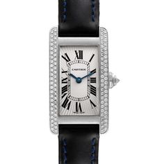 Cartier Tank Americaine White Gold Diamond Ladies Watch WB701851. Quartz movement. 18K white gold case 19.0 x 35.0 mm with 2 rows of diamond on the sides. Circular grained crown set with faceted diamond. . Scratch resistant sapphire crystal. Silver guilloche dial with black roman numerals. Sword shape blue steel hands. Secret Cartier signature at X. Black leather strap with blue stitching and 18K white gold tang buckle. Cartier Diamond Watch With Diamond Accents, Cartier Diamond Watch With Round Dial, Designer Diamond Cartier Watch, Classic Wedding Jewelry And Watches With Diamond Hour Markers, Cartier Diamond Watch With Palladium Hardware, Designer Cartier Diamond Watch, Cartier Designer Diamond Watch, Luxury Cartier Diamond Watch For Anniversary, Cartier Diamond Watch With Brilliant Cut