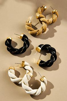 Polyurethane, gold-plated brass Post styling Imported | Faux-Leather Twist Hoop Earrings by Anthropologie in Black, Women's, Gold/Plated Brass/Polyurethane Twist Hoop Earrings, Anthropologie Earrings, Black Hoops Earrings, Earring Hoop, Leather Earring, Anthropologie Accessories, Black Jewelry, Threader Earrings, White Beige