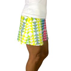 Step up your game in this fun neon tetris print athletic skirt with built in compression shorts and pocket. This golf, tennis, running or sports skirt is slim-style, but allows for plenty of movement, made of high quality performance spandex. The compression shorts are uniquely designed to be incredibly comfortable and won't ride up during activity. The pockets are positioned on the sides of the shorts, and will fit your phone, keys, ID, etc. *PLEASE NOTE - the compression shorts attached to thi Summer Sports Shorts With Lined Skirt, Athleisure Skort With Built-in Shorts For Pickleball, Green Sports Skirt For Spring, Multicolor Skort For Spring, Spring Tennis Athletic Shorts With Built-in Shorts, Multicolor Athletic Shorts With Built-in Shorts For Spring, Sporty Skort For Pickleball In Spring, Summer Athleisure Bottoms For Pickleball, Fitted 2-in-1 Athletic Shorts For Tennis