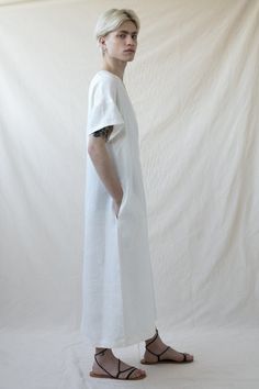 Unique white maxi dress, Minimalist natural linen dress tunic, Loose white unisex dress, Kaftan for men, Will be Perfect as a gift.Unique minimalist dress in white. This tunic dress is not only extremely comfortable and flattering but also very versatile with a relaxed A shape,A V-neck forms a delicate look with short sleeves, Made from pure linen and sewn with extreme precision by the hand of a tailor.An embroidered stitch on the shoulders gives this urban tunic dress an artistry look.Wear this Relaxed Fit Maxi Length Linen Dress For Daywear, Relaxed Fit Linen Maxi Dress For Daywear, White Linen Midi Dress For Daywear, White Unlined Linen Dress, Unlined White Linen Dress, White Unlined Linen Maxi Dress, Oversized White Midi Dress For Daywear, White Linen Maxi Dress With Short Sleeves, White Unlined Linen Dress For Daywear