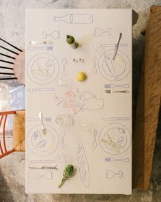 an overhead view of a table with utensils on it