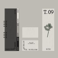 an assortment of business cards and stationery items