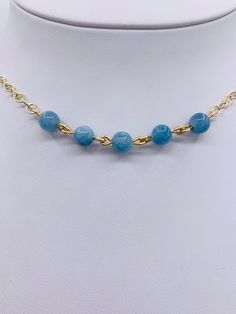 This is a Beautiful Natural Gemstone Aquamarine Necklace that features sky blue aquamarine gemstones, the March birthstone. This has a 14k Gold Filled chain and clasp. This is adjustable from 16 -19” long and can be worn as a choker or necklace. The 14k gold filled chains and clasps in our shop are sourced from highly reputable U.S.A. vendors and have over 100 times more 14k gold than gold plating. With proper care, it will stay beautiful forever. Please do not wear it in hot tubs or swimming po March Birthstone Necklace, Aquamarine Necklace, Aquamarine Jewelry, March Birthstone, Aquamarine Gemstone, Aquamarine Blue, March Birth Stone, Birthstone Necklace, Gold Filled Chain