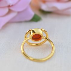 D E T A I L S - Metal: 925 Sterling Silver Stone: Natural Carnelian The fit: True to US ring size Finish: smooth and gold-Plated to a high shine S H I P P I N G & P R O D U C T I O N - My current production time is 2-6 business days, which means after those days are up, your order ships! I make everything custom to order, by hand, but I promise you it's worth the wait! R U S H - M Y - O R D E R - If you're in a rush to get your pretty new pieces, please send me a message and I'll let you kno Amber Open Ring For Anniversary, Amber Wedding Rings With Polished Finish, Amber Open Ring For Promise, Polished Open Moonstone Ring As Gift, Adjustable Amber Promise Ring, Amber Round Rings For Wedding, Amber Hallmarked Promise Ring, Adjustable Ruby Ring With Bezel Setting, Amber Gemstone Ring For Promise