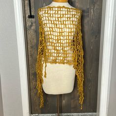 Mustard Knitted Poncho Fall Crochet Poncho One Size, Knitted Yarn Poncho For Fall, Casual Open Knit Poncho One Size, Casual One Size Open Knit Poncho, Spring Open Knit Poncho One Size, Crochet Shawl For Fall, One Size Crochet Shawl For Fall, Crochet Shawl For Fall, One Size, Bohemian Open Knit Poncho One Size