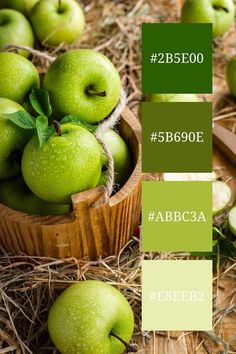 green apples are in a wooden bowl on straw with the words abcc3a below it