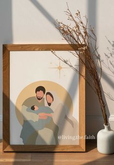 a wooden frame with a painting of a man and woman hugging each other in front of a white wall